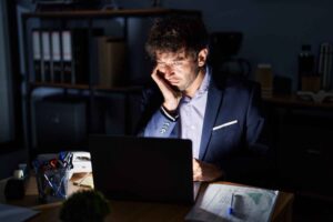 Trader calmly following a structured trading plan and analyzing market conditions, illustrating how disciplined traders focus on process, execution, and risk management rather than constant market excitement or short-term results.