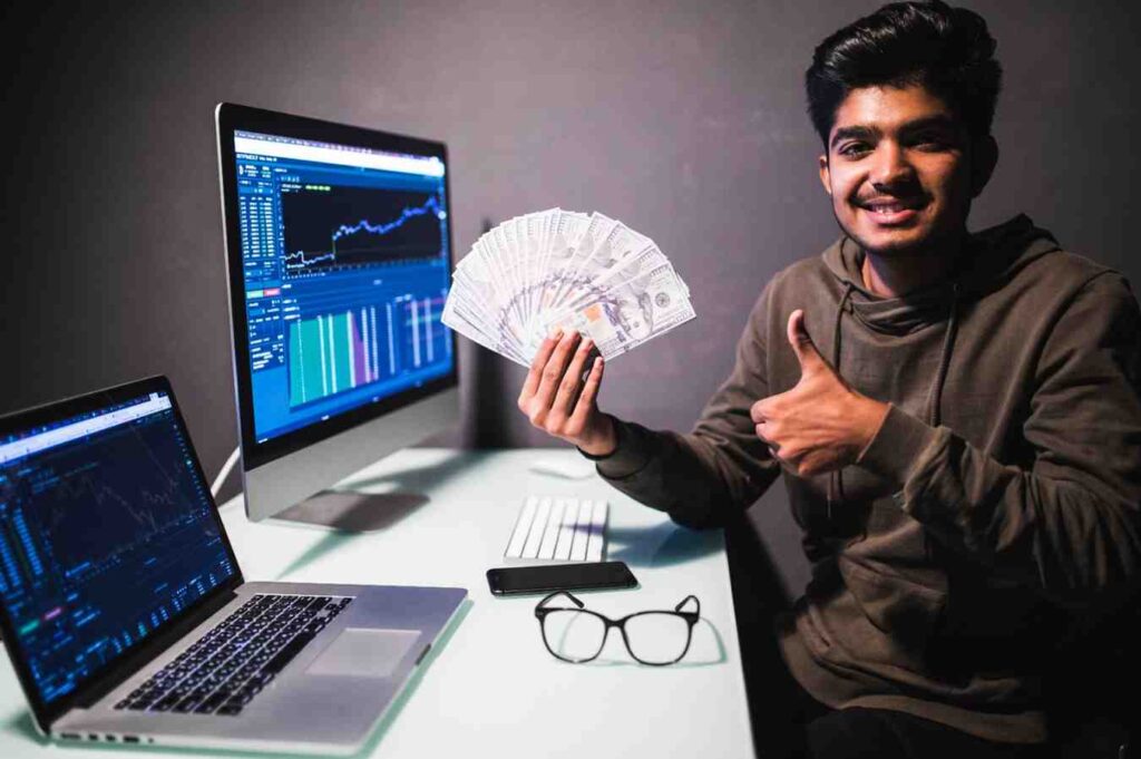 Trader analyzing market charts and focusing on risk management and disciplined decision-making, illustrating why making money consistently is more important than being right on every trade.