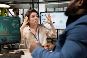 Trader making an emotional trading decision after expecting a specific market outcome, illustrating how unrealistic expectations can lead to poor trading decisions, rule-breaking, and inconsistent performance.
