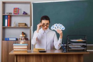 ### **Alt Text** Trader reviewing charts and following a structured trading plan, illustrating practical ways to develop a probability-based mindset through discipline, risk management, and consistent decision-making.