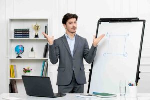 Trader reviewing a trading journal and risk management plan while analyzing market charts, illustrating practical ways to develop realistic expectations through patience, discipline, and long-term thinking.